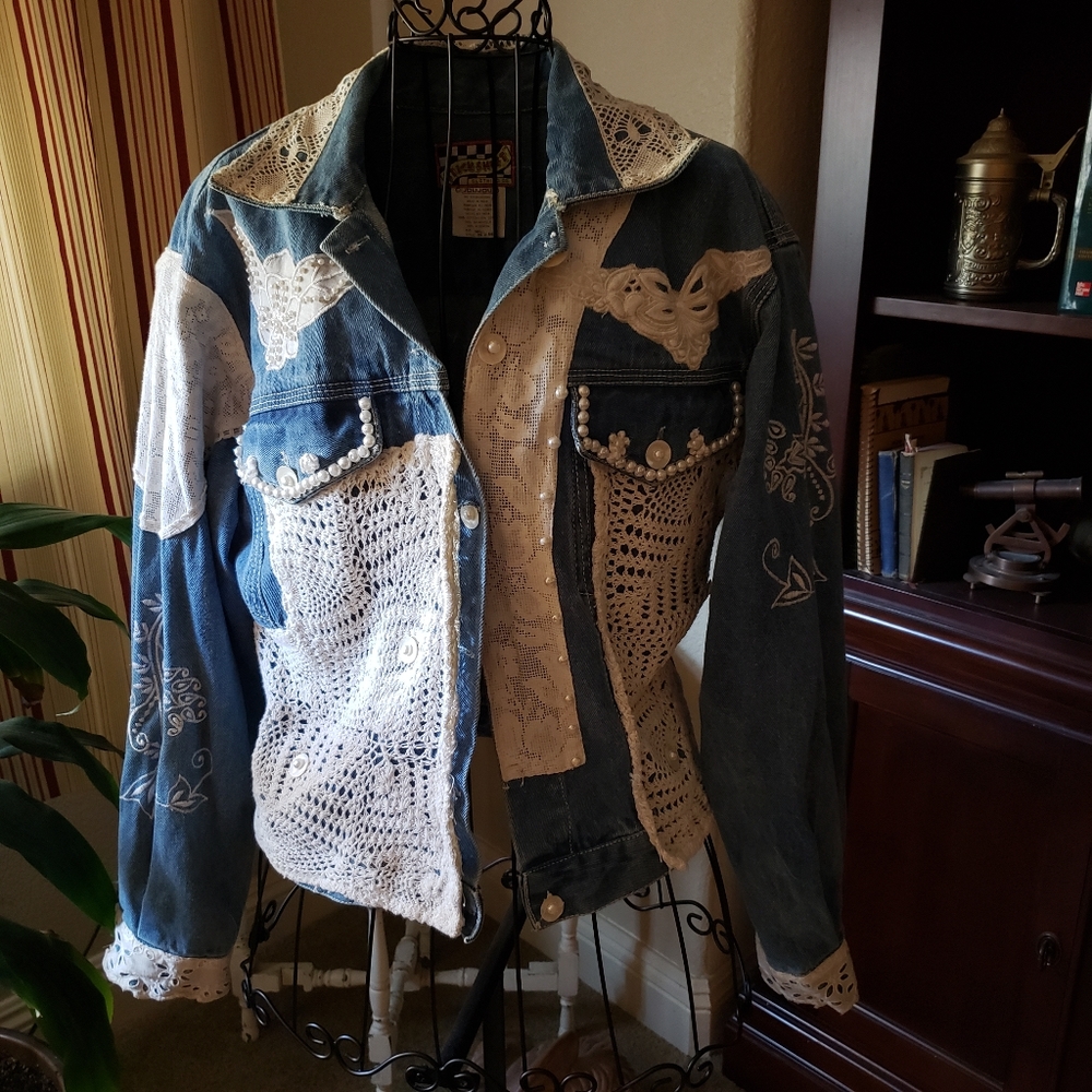 Beautiful jean jacket with lace details.